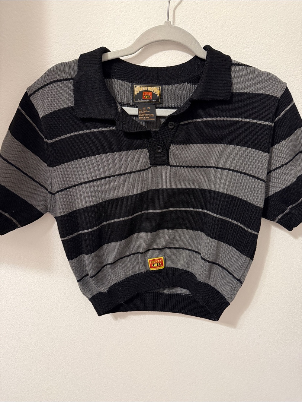FB County black and grey stripped top
